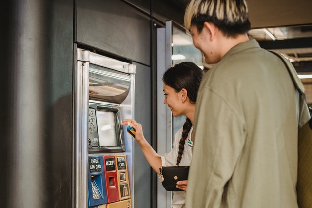 Digital Nomad at an ATM